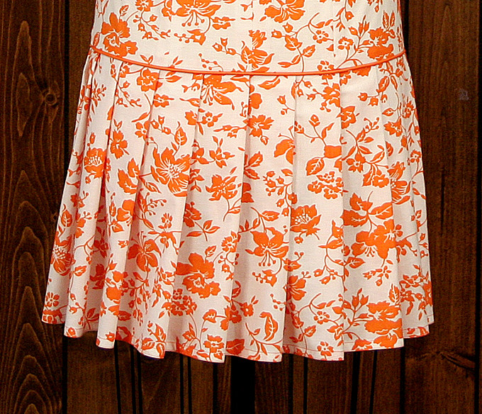 Pleated skirt of dress